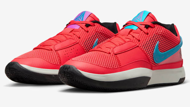Side view of Ja Morant's red, blue, and white Nike shoes.